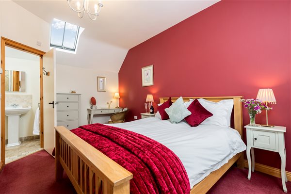 room with oak bed and view to ensuite